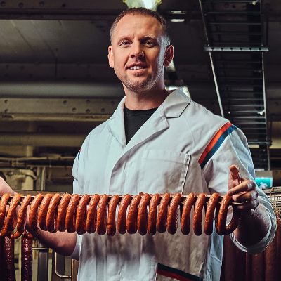 a-man-in-sausage-storage-8MJN556.jpg